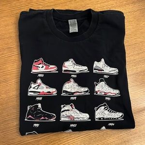 Gildan 100% Heavy Cotton Black “Jordan Retro” Graphic T-Shirt Air Jordan History